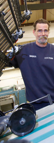 man working in bindery